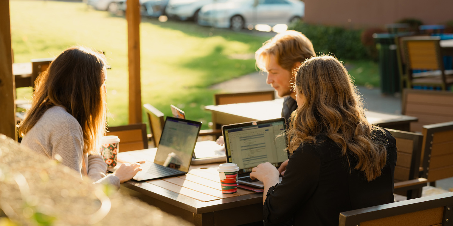 Students study in the coffee shop on campus.